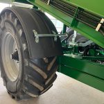 Close view of a GreenLoader tyre and mudflap under the body.