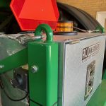The GreenLoader control box with an amber beacon and a side switch.