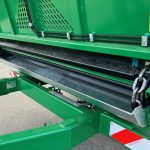 A slatted floor under the front of a GreenLoader body.