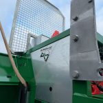 Close-up of a silver bracket with the ACJ logo on a PowerWinch frame.